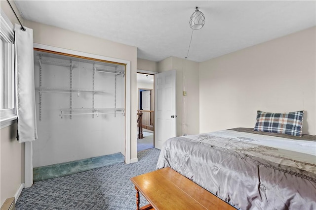 7425 State Route 20a, Bristol, NY 14469 - carpeted bedroom featuring a closet, baseboards, and a baseboard heating unit