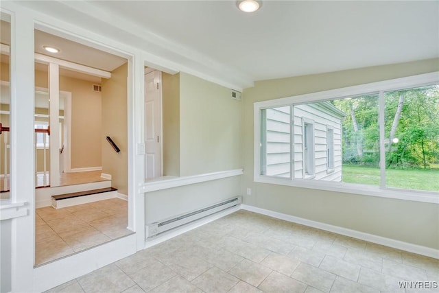 4356 Redman Rd, Sweden, NY 14420 - empty room featuring a baseboard heating unit, healthy amount of natural light, tile patterned floors, lofted ceiling, and recessed lighting