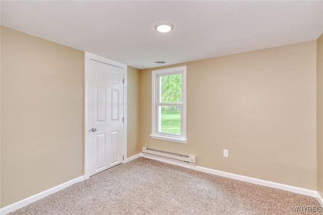 4356 Redman Rd, Sweden, NY 14420 - carpeted spare room with a baseboard heating unit and baseboards