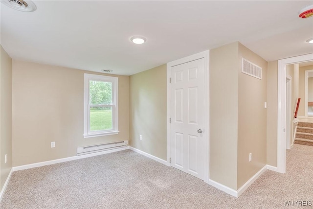 4356 Redman Rd, Sweden, NY 14420 - unfurnished bedroom featuring a baseboard heating unit and carpet