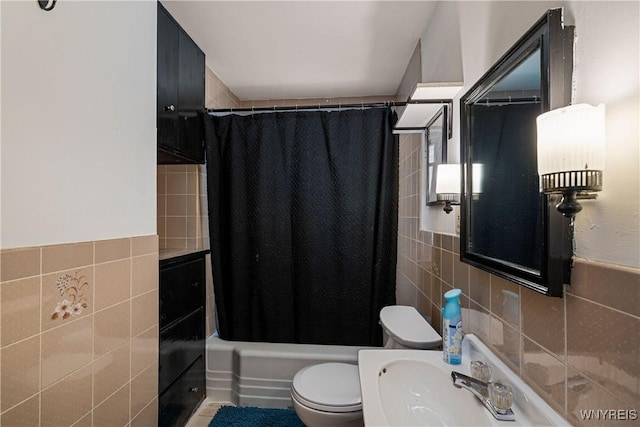 1934 Welch Ave, Niagara Falls, NY 14303 - bathroom with tile walls, toilet, shower / bath combo, and a sink