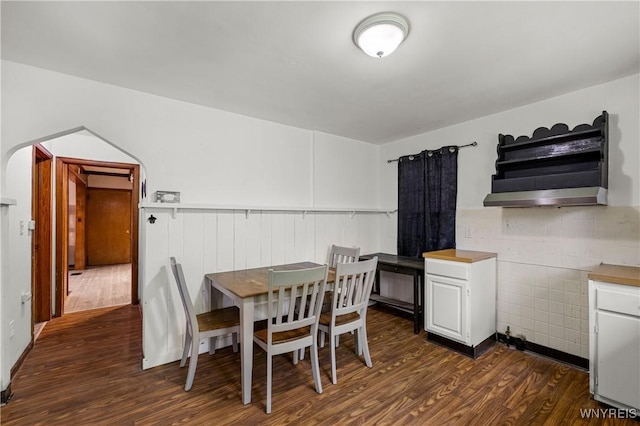 1934 Welch Ave, Niagara Falls, NY 14303 - dining space featuring dark wood-type flooring and wainscoting