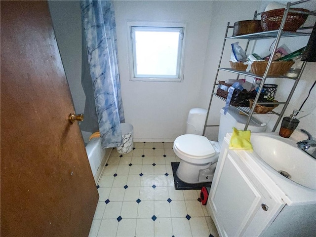 127 Ave B, Rochester, NY 14621 - full bath with vanity, toilet, shower / bathtub combination with curtain, and tile patterned flooring