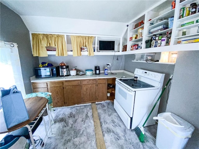 127 Ave B, Rochester, NY 14621 - kitchen with white range with electric cooktop, brown cabinets, open shelves, light countertops, and vaulted ceiling