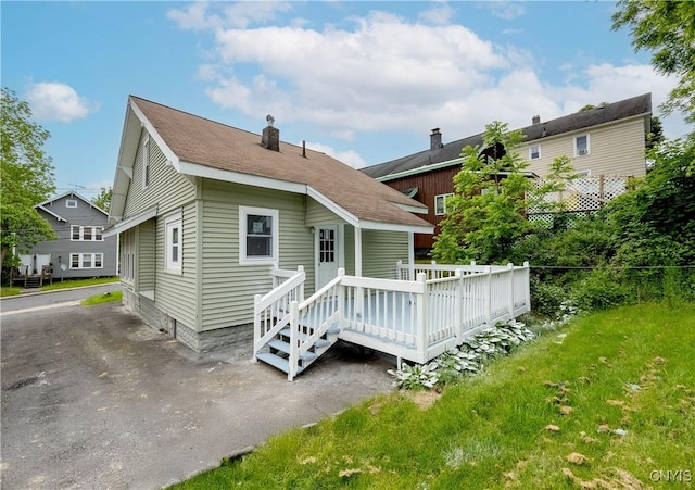 402 Cogswell Ave, Geddes, NY 13209 - rear view of house with a deck