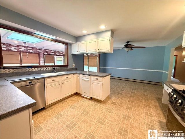 56 Otter St, Dunkirk-City, NY 14048 - kitchen with appliances with stainless steel finishes, a ceiling fan, dark countertops, a peninsula, and recessed lighting