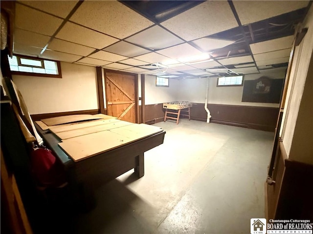 56 Otter St, Dunkirk-City, NY 14048 - game room with concrete floors, a paneled ceiling, and plenty of natural light