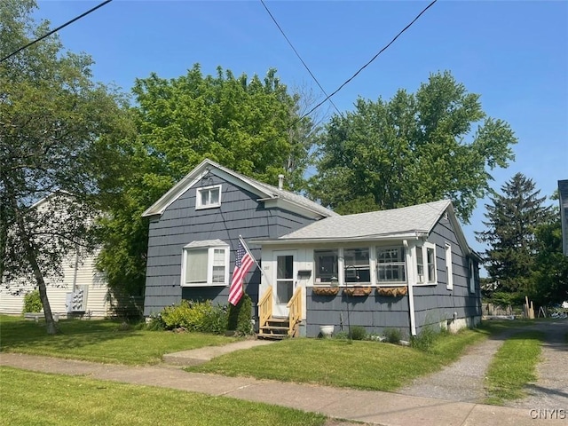 207 E Elm St, Oneida-Inside, NY 13421 - view of front of property featuring entry steps and a front yard