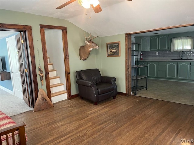 207 E Elm St, Oneida-Inside, NY 13421 - living area featuring a ceiling fan, dark wood-style floors, baseboards, stairway, and vaulted ceiling