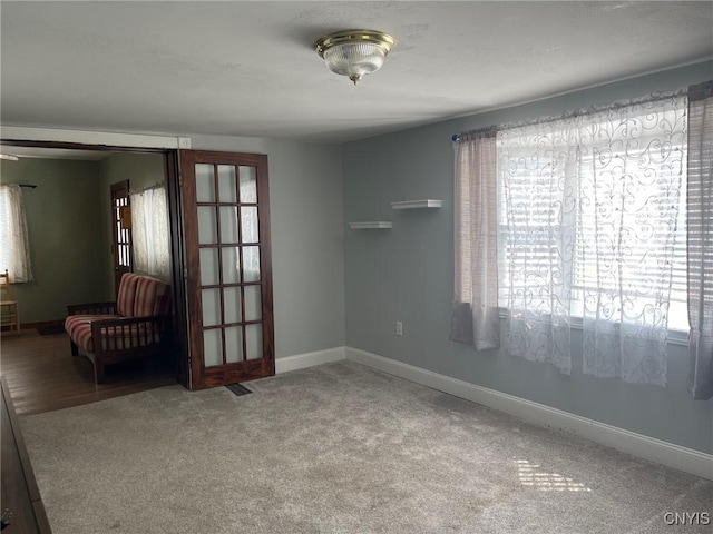 207 E Elm St, Oneida-Inside, NY 13421 - unfurnished room featuring carpet and baseboards