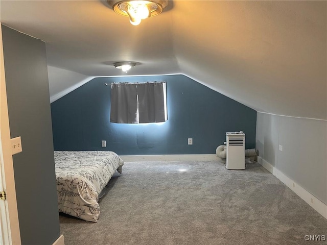 207 E Elm St, Oneida-Inside, NY 13421 - bedroom featuring vaulted ceiling, carpet, and baseboards