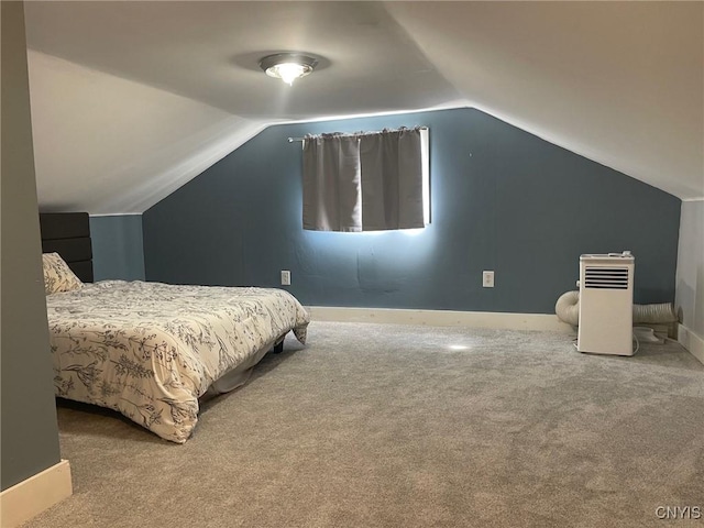 207 E Elm St, Oneida-Inside, NY 13421 - bedroom with lofted ceiling, carpet flooring, and baseboards