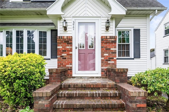 377 Winfield Rd, Irondequoit, NY 14622 - entrance to property featuring roof with shingles and brick siding