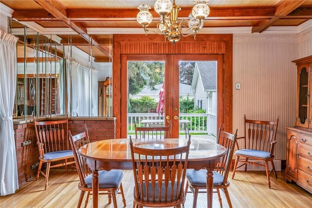 377 Winfield Rd, Irondequoit, NY 14622 - dining room with light wood-style flooring, french doors, coffered ceiling, a chandelier, and wooden ceiling with exposed beams