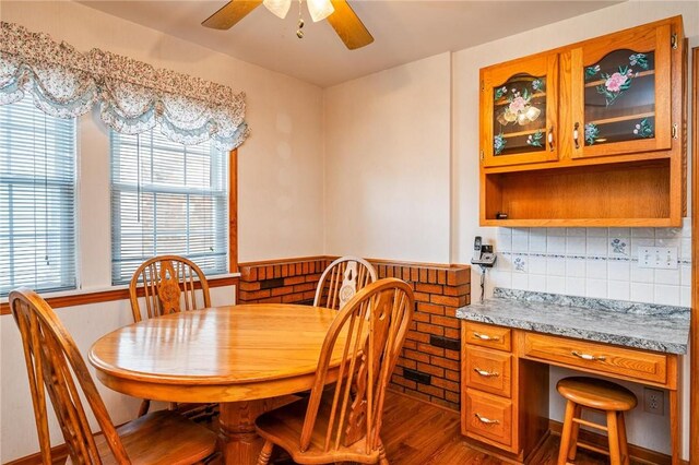 377 Winfield Rd, Irondequoit, NY 14622 - dining space with a ceiling fan, dark wood-type flooring, and healthy amount of natural light