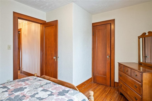 377 Winfield Rd, Irondequoit, NY 14622 - bedroom with wood finished floors and baseboards