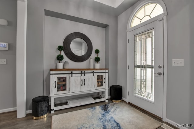 27 Skylark Ln, Wheatfield, NY 14304 - entryway with baseboards and wood finished floors