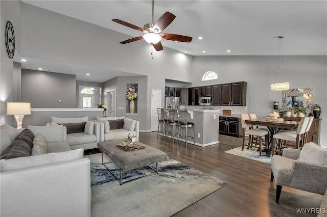 27 Skylark Ln, Wheatfield, NY 14304 - living area with high vaulted ceiling, a ceiling fan, dark wood-style floors, recessed lighting, and baseboards