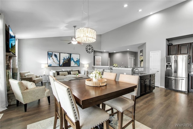 27 Skylark Ln, Wheatfield, NY 14304 - dining room with dark wood finished floors, a chandelier, high vaulted ceiling, recessed lighting, and ceiling fan