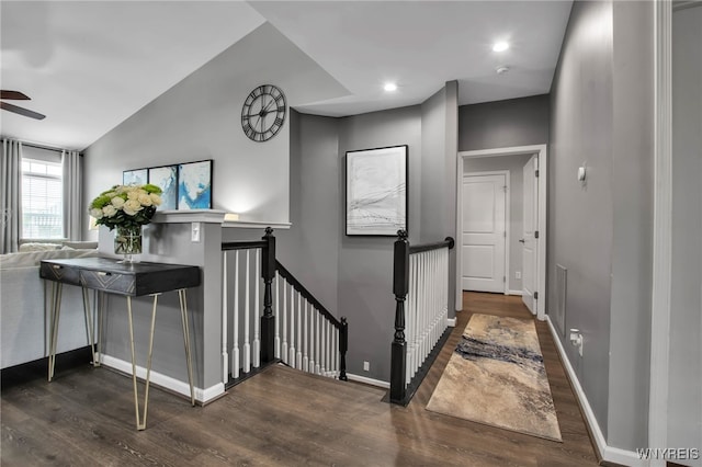 27 Skylark Ln, Wheatfield, NY 14304 - hall featuring an upstairs landing, wood finished floors, vaulted ceiling, and recessed lighting