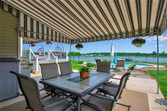 27 Skylark Ln, Wheatfield, NY 14304 - view of patio / terrace with outdoor dining space and a water view