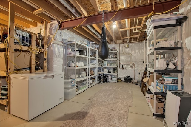 27 Skylark Ln, Wheatfield, NY 14304 - unfinished basement with white refrigerator