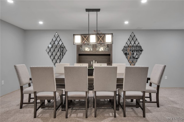 27 Skylark Ln, Wheatfield, NY 14304 - dining space with light carpet, recessed lighting, and bar area