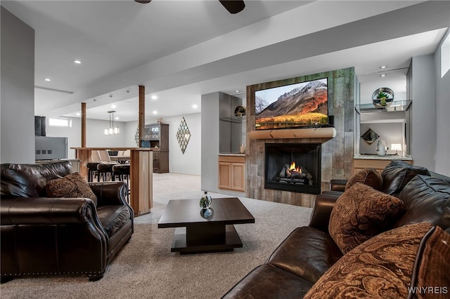 27 Skylark Ln, Wheatfield, NY 14304 - living area featuring a tile fireplace, light colored carpet, recessed lighting, and a ceiling fan