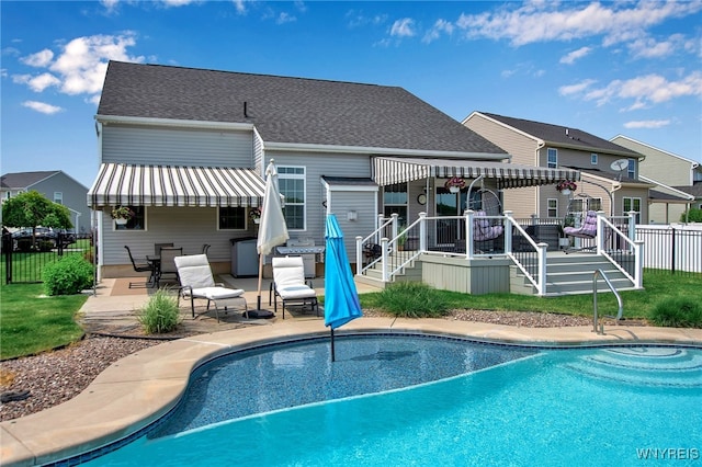 27 Skylark Ln, Wheatfield, NY 14304 - rear view of property with a patio area, a wooden deck, and roof with shingles