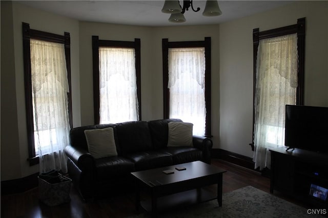 42 Mechanic St, Elbridge, NY 13080 - living area featuring wood finished floors and baseboards