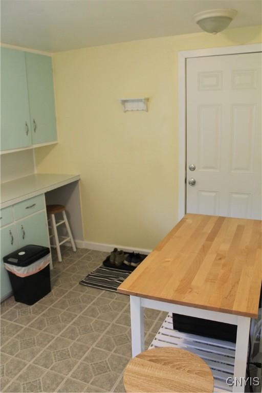 42 Mechanic St, Elbridge, NY 13080 - laundry area with baseboards