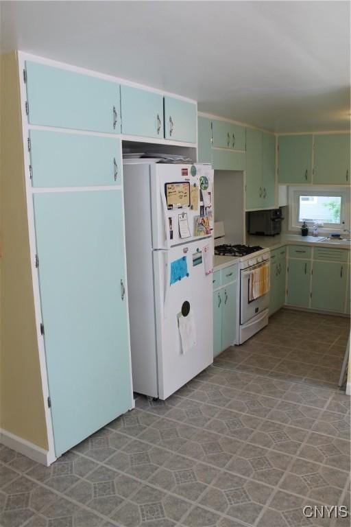 42 Mechanic St, Elbridge, NY 13080 - kitchen featuring white appliances and light countertops