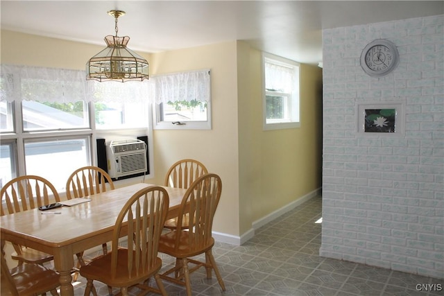 42 Mechanic St, Elbridge, NY 13080 - dining area with baseboards and a chandelier