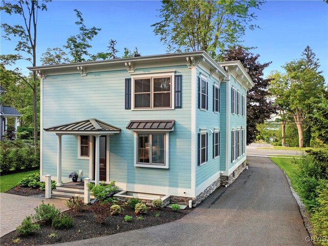 149 E Genesee St, Skaneateles, NY 13152 - italianate home featuring driveway