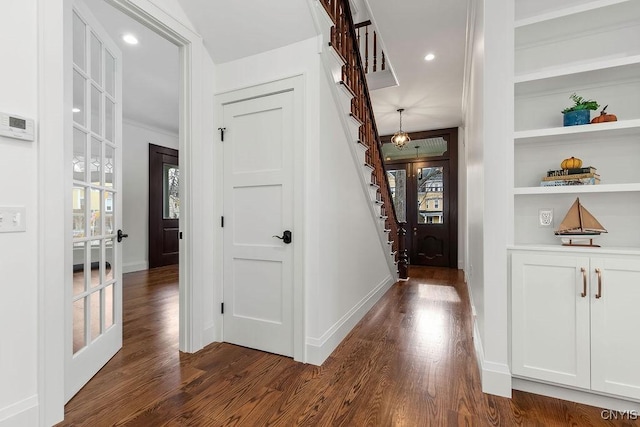 149 E Genesee St, Skaneateles, NY 13152 - corridor featuring stairs, dark wood-style flooring, plenty of natural light, baseboards, and recessed lighting