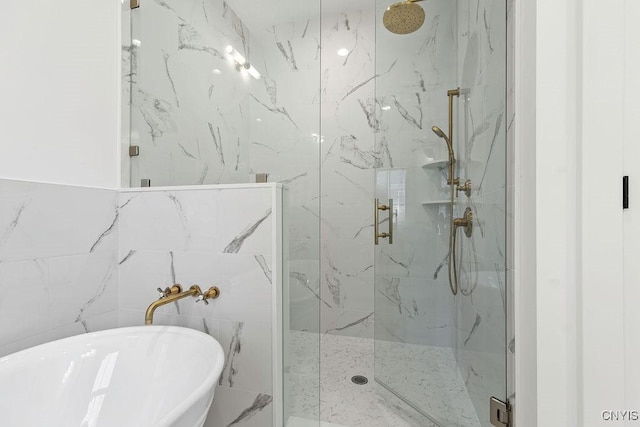 149 E Genesee St, Skaneateles, NY 13152 - bathroom featuring a soaking tub and a marble finish shower