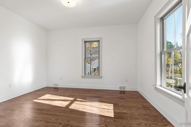 149 E Genesee St, Skaneateles, NY 13152 - spare room featuring wood finished floors and baseboards