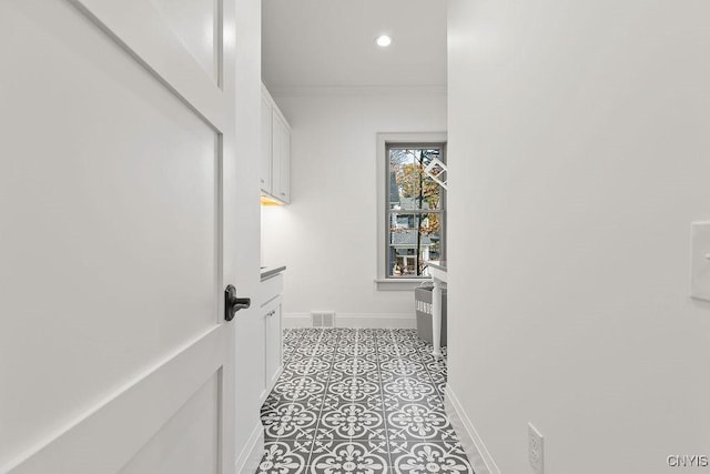 149 E Genesee St, Skaneateles, NY 13152 - corridor with ornamental molding, baseboards, and recessed lighting