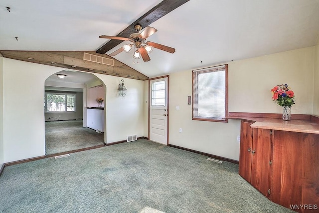 831 W Gebhard Ln, Alden, NY 14004 - carpeted empty room featuring ceiling fan, arched walkways, and baseboards