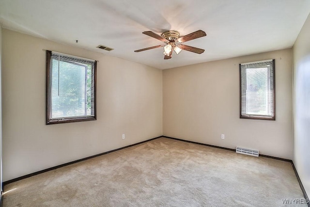 831 W Gebhard Ln, Alden, NY 14004 - carpeted spare room featuring plenty of natural light, a ceiling fan, and baseboards