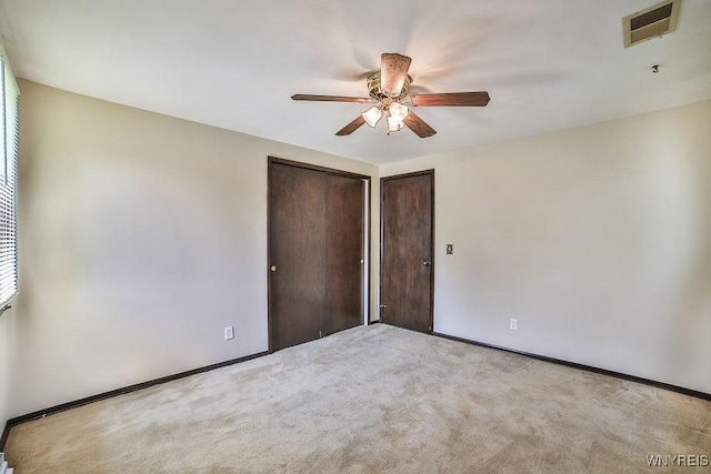 831 W Gebhard Ln, Alden, NY 14004 - unfurnished bedroom with carpet floors, a ceiling fan, and baseboards