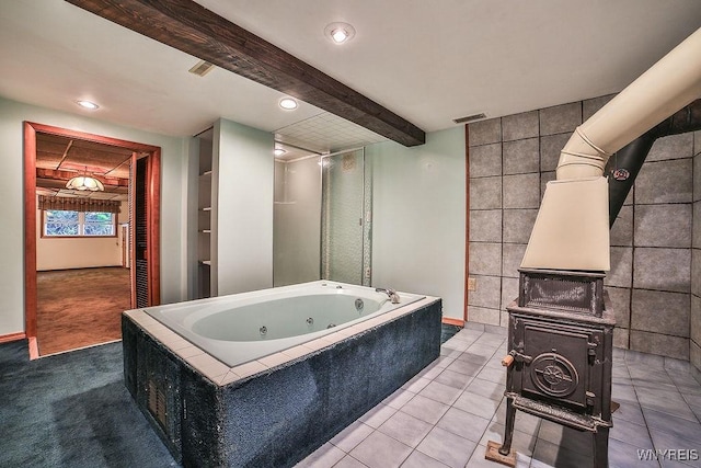 831 W Gebhard Ln, Alden, NY 14004 - bathroom featuring a tub with jets, beamed ceiling, baseboards, and recessed lighting