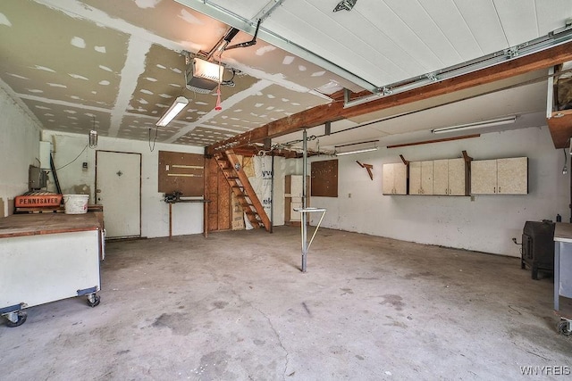 831 W Gebhard Ln, Alden, NY 14004 - garage featuring a garage door opener