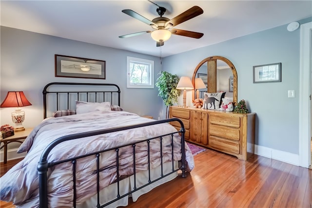 2550 E Ave, Brighton, NY 14610 - bedroom with wood finished floors and ceiling fan