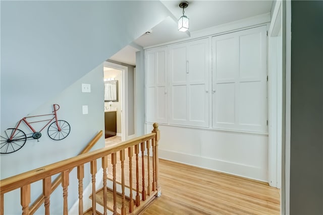 2550 E Ave, Brighton, NY 14610 - hall with an upstairs landing and light wood-type flooring