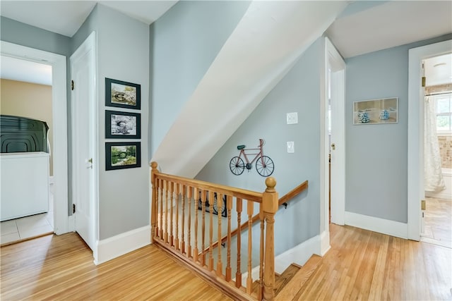 2550 E Ave, Brighton, NY 14610 - corridor with an upstairs landing and wood finished floors