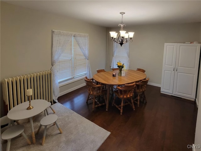 35 N 4th Ave, German Flatts, NY 13357 - dining area with radiator, a chandelier, and dark wood-style flooring