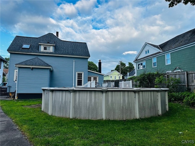 35 N 4th Ave, German Flatts, NY 13357 - back of house featuring a shingled roof