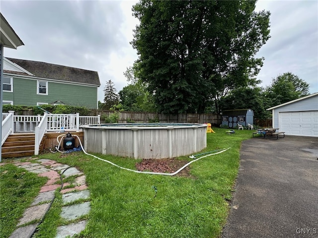 35 N 4th Ave, German Flatts, NY 13357 - view of yard featuring a deck and a storage unit