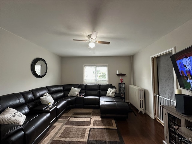 35 N 4th Ave, German Flatts, NY 13357 - living area with radiator, ceiling fan, and wood finished floors